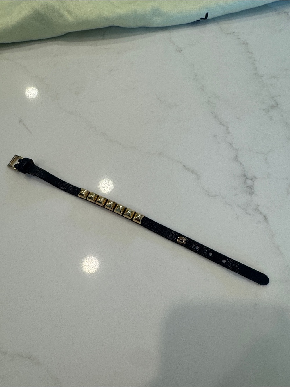 Juicy Couture Black Bracelet with Gold Pyramid Studs